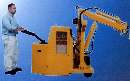 Compact Reversible Boom Crane maneuvers in tight places.