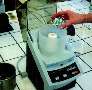 Knife Mill grinds coated tablets for analysis.