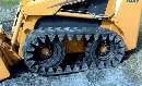 Skid-Steer Loader incorporates rubber tracks.