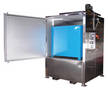 Electric Tote Warming Oven incorporates spill containment.