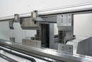 Automated Tool Changing Press Brake has 220 ton capacity.