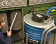 HEPA Vacuum attaches to 55 gallon open top drum.