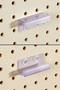 Stand-Off Sign Holder enhances pegboard signage.