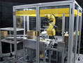 
New Ultra Compact TaskMate� Robotic Case Erector / Loader with Track & Trace at Interphex NY 2013
