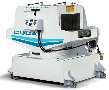 Aqueous Parts Washer cleans parts on assembly line.