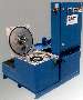 Centrifuge removes oil and sludge from washers.