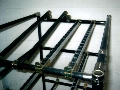 Minature Roller Conveyor suits light-duty parts handling.