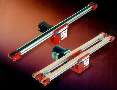 Flat Belt Conveyors provide small part transfer.