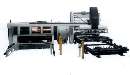 Laser System includes material storage tower.