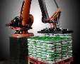 Robot palletizes pails at rate of 50/min.
