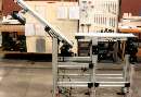 Lift Gate Conveyors allow walk-through access.
