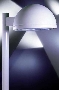 Dome-Shaped Cutoff Luminaires illuminate outdoor areas.