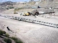 Telescoping Conveyors minimize loader use.