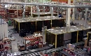 Robotic Welding Cell Enclosure has air filtration unit.