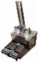 Friction Feeder System handles items down to 1.5 in.².
