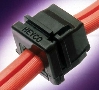Strain Reliefs protect cords/cables in u-shaped slots.