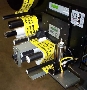 Label Applicator dispenses labels at 4–12 ips.