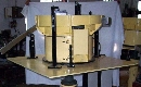 Vibratory Bowl Feeder feeds diodes in rolling orientation.