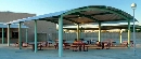 Steel Shelters are offered with custom-curved metal roofs.