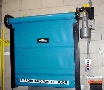 Conveyor Door separates material handling flow.