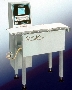 In-Motion Checkweigher includes metal detector.
