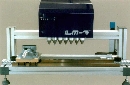 In-Line Dot Peen Marking System prints on moving parts.
