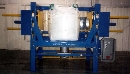 Bulk Bag Discharger conditions discharged material.