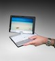 Notebook Computer converts into slate tablet.