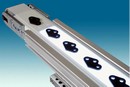 Backlit Conveyor illuminates part profile and appearance.