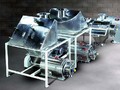 Centrifugal Screener includes integral bag dump station.