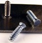Flush-Head Studs mate quickly with plastic nuts and clips.