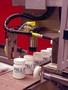 Detection/Inspection Device ensures accurate seal.