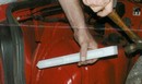 Multi-Purpose Tool helps repair body lines.