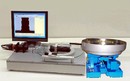 Automatic Flat Platen Sorter inspects small parts.