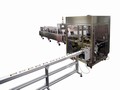 Automated System collates and packs cereal bars.