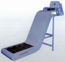 Magnetic Conveyor handles ferrous and non-ferrous chips.