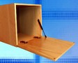 Damper facilitates access to cabinets that open downward.