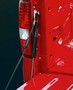 Drop-Gate Damper controls opening of vehicle tailgate.