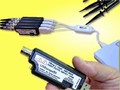 Oscilloscope utilizes USB hub for multi-channel operation.