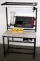 Heavy-Duty Workstation is height-adjustable.