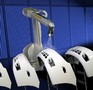 Robot coats consumer and automotive products.