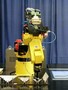 Sorting Robot removes cut shapes from cutting machine.