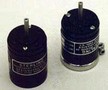Gearheads fit various information transducing devices.