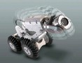 Crawler System uses camera lift accessory for inspection.