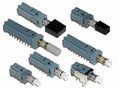 Pushbutton Switches feature subminiature design.