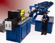 Press System straightens and cuts metal coils.