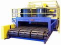 Conveyor Oven tempers transmission components at 300°F.