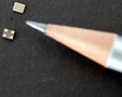 RoHS-Compliant Quartz Crystal measures 2 x 2.5 x 0.57 mm.