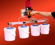 Vacuum Lifter speeds handling of pails.