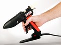 Hot Melt Glue Applicator melts up to 4.4 lb of glue/hr.